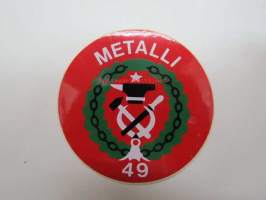 Metalli 49 -tarra