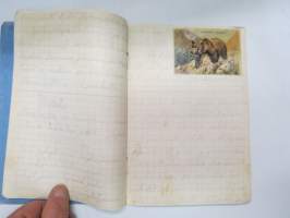 Eläinoppi vihko - tyypillinen kouluvihko, jossa tekstiä elävöittämässä pari kiiltokuvaa eläimistä -school notebook