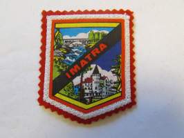 Imatra -kangasmerkki / matkailumerkki / hihamerkki / badge -pohjaväri punainen