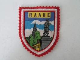 Raahe -kangasmerkki / matkailumerkki / hihamerkki / badge -pohjaväri punainen