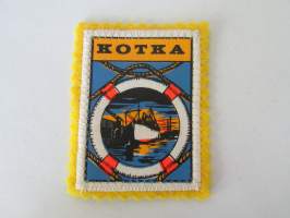 Kotka -kangasmerkki / matkailumerkki / hihamerkki / badge -pohjaväri keltainen