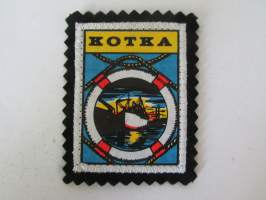 Kotka -kangasmerkki / matkailumerkki / hihamerkki / badge -pohjaväri musta