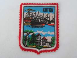 Kotka -kangasmerkki / matkailumerkki / hihamerkki / badge -pohjaväri punainen