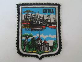 Kotka -kangasmerkki / matkailumerkki / hihamerkki / badge -pohjaväri musta