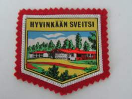 Hyvinkää - Sveitsi -kangasmerkki / matkailumerkki / hihamerkki / badge -pohjaväri punainen