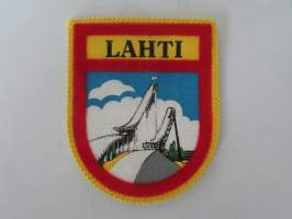 Lahti -kangasmerkki / matkailumerkki / hihamerkki / badge -pohjaväri keltainen