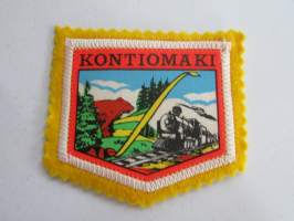 Kontiomäki -kangasmerkki / matkailumerkki / hihamerkki / badge -pohjaväri keltainen