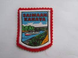 Saimaan kanava -kangasmerkki / matkailumerkki / hihamerkki / badge -pohjaväri punainen