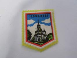 Ilomantsi -kangasmerkki / matkailumerkki / hihamerkki / badge -pohjaväri keltainen