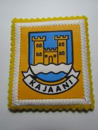 Kajaani -kangasmerkki / matkailumerkki / hihamerkki / badge -pohjaväri keltaoranssi