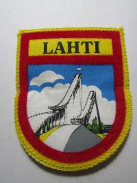 Lahti -kangasmerkki / matkailumerkki / hihamerkki / badge -pohjaväri keltainen