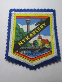 Nykarleby -kangasmerkki / matkailumerkki / hihamerkki / badge -pohjaväri sininen