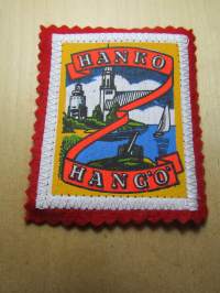 Hanko -Hangö -kangasmerkki / matkailumerkki / hihamerkki / badge -pohjaväri punainen