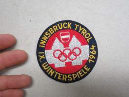 IX (Olympische) Winterspiele 1964 Innsbruck Tyrol -kangasmerkki, matkailumerkki