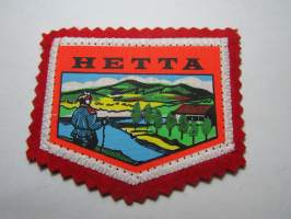 Hetta -kangasmerkki / matkailumerkki / hihamerkki / badge -pohjaväri punainen