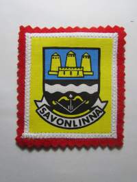 Savonlinna -kangasmerkki / matkailumerkki / hihamerkki / badge -pohjaväri punainen