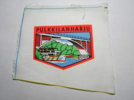 Pulkkilanharju -kangasmerkki, matkailumerkki, leikkaamaton