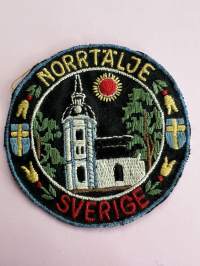 Norrtälje - Sverige -hihamerkki, kangasmerkki -matkamuistomerkki
