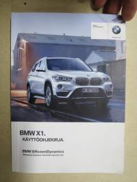 BMW X1 käyttöohjekirja alkuperäisessä kotelossaan