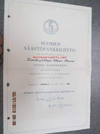 Suomen Säästöpankkiliitto / Klaus Stenroos / ansiomerkki -myöntökirja