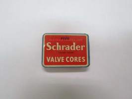 Schrader valve cores -venttiilejä peltirasiassa